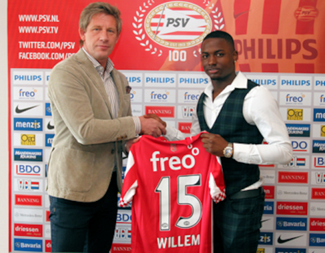 PSV technical director Marcel Brands presents Willems with the no.15 shirt
