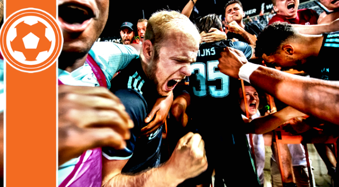 Davy’s double helps Ajax prevail and clinch playoff place